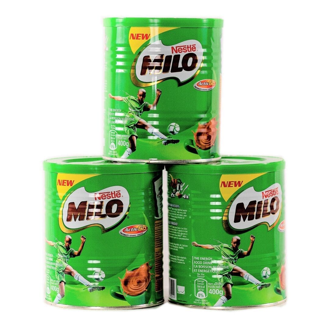 Three cans of milo are stacked on top of each other.