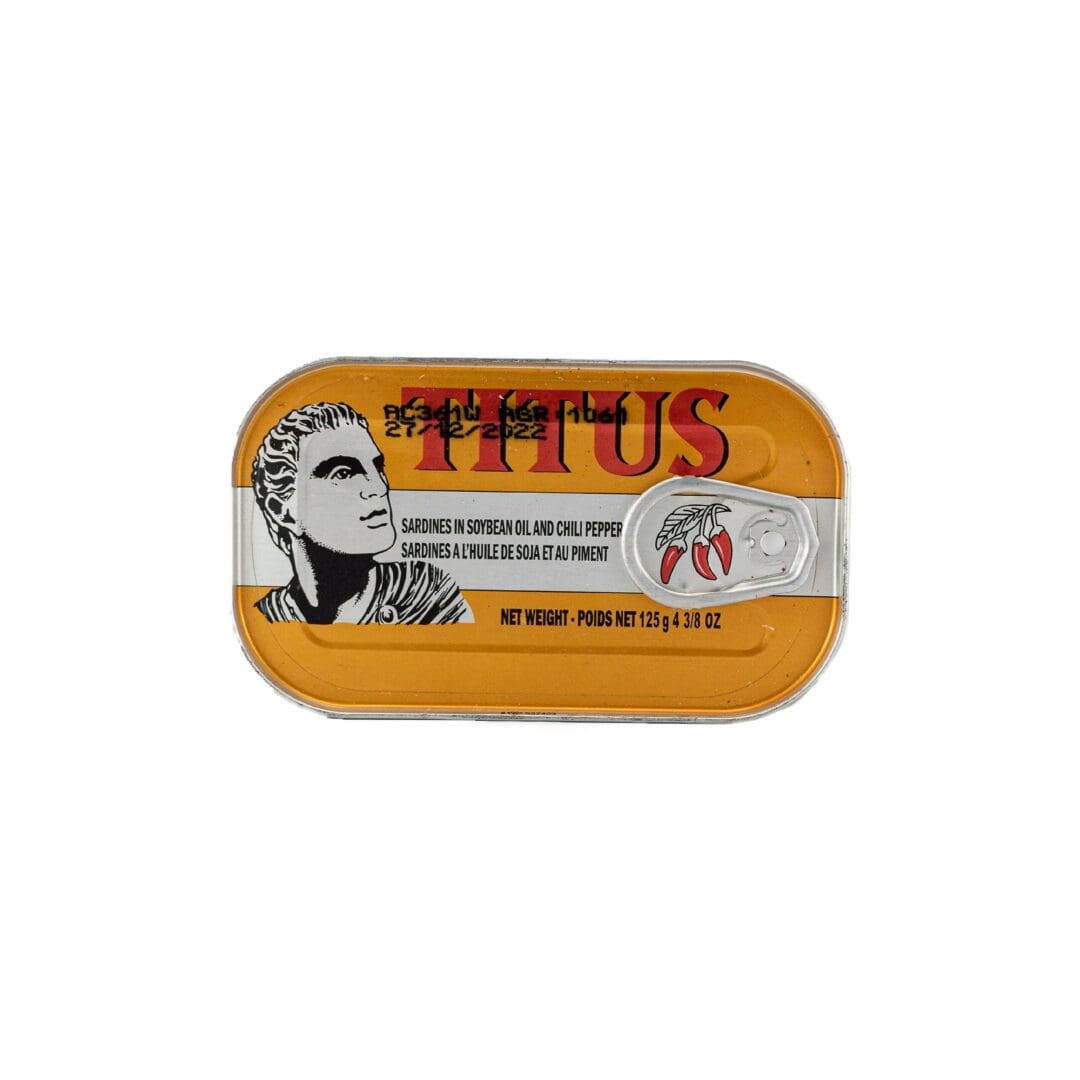 A tin of titus tuna fish on a white background