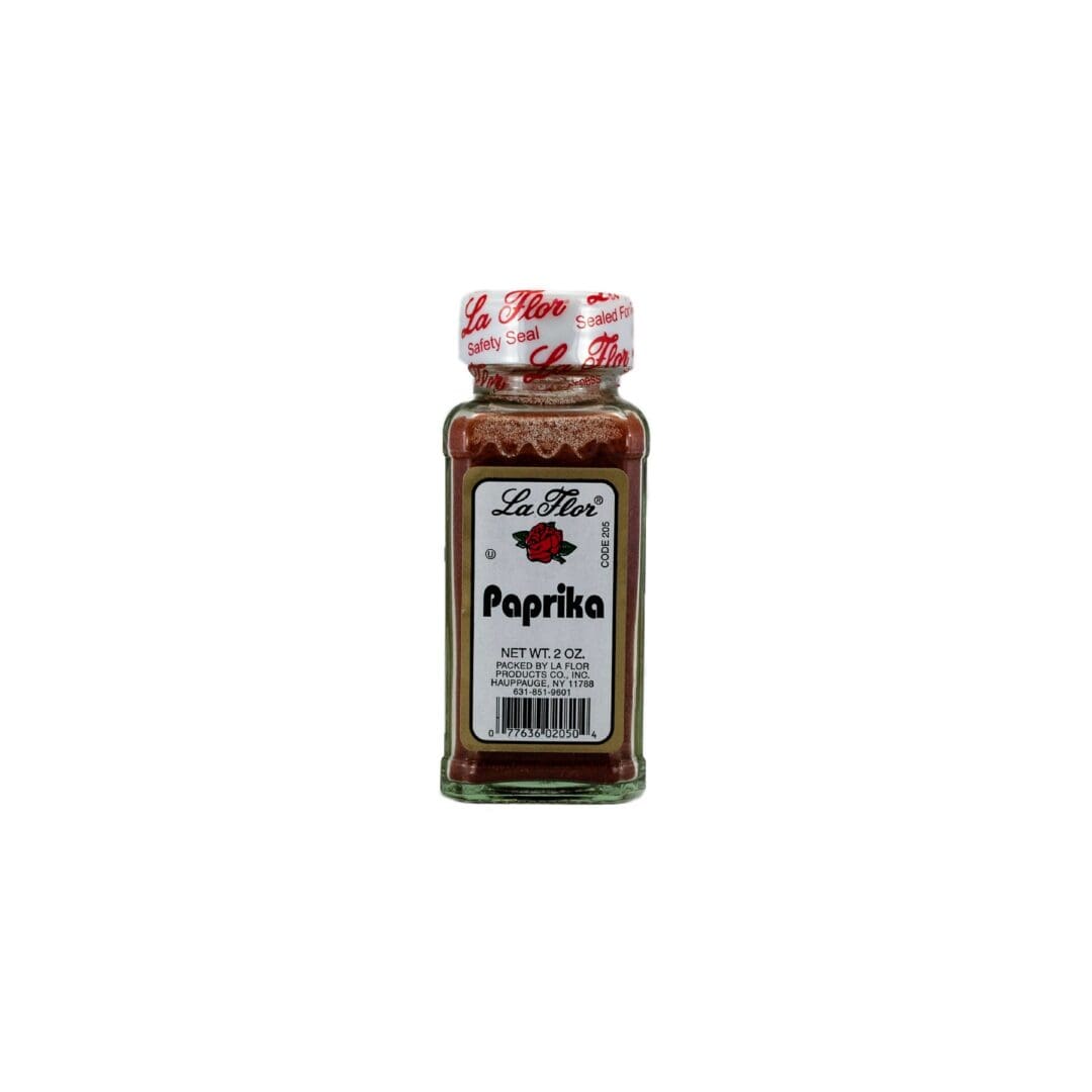 A jar of paprika is shown on a white background.