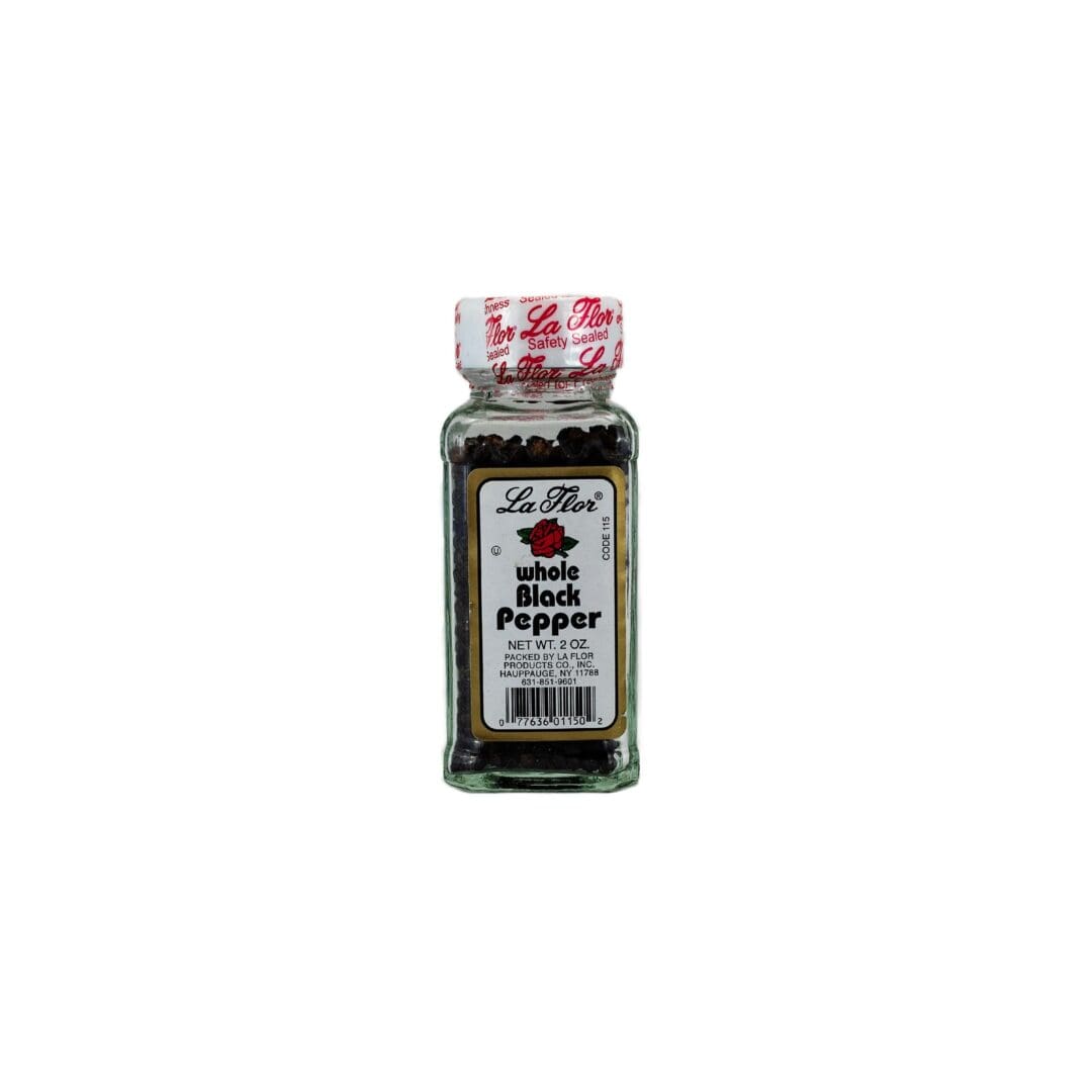 A bottle of black pepper on top of white background.