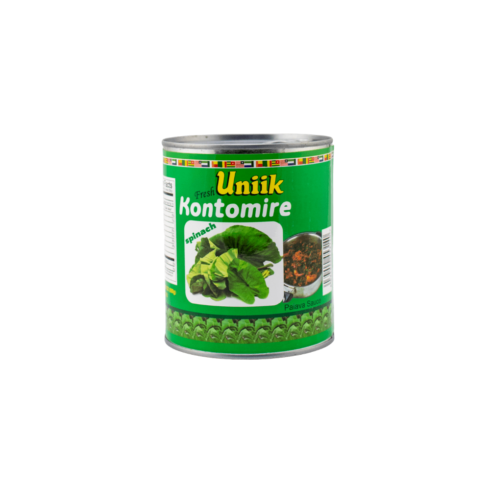 A can of food with green leaves on it.